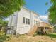 Backyard showcasing a raised wood deck and the exterior of the house at 2317 Colony Woods Dr, Apex, NC 27523