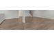Finished basement with wood grain floors, white trim and a staircase to the main level at 248 Ashford Dr, Pittsboro, NC 27312