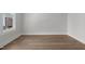 Spacious, bright room with wood floors, offering a versatile area for your personal touch at 248 Ashford Dr, Pittsboro, NC 27312