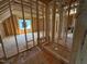 Exposed wood framing of the bathroom with a built in bench and a large window at 253 Inspiration Way, Fuquay Varina, NC 27526