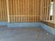 Unfinished garage with concrete walls at 253 Inspiration Way, Fuquay Varina, NC 27526