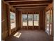 Unfinished room featuring abundant natural light, promising a bright and airy atmosphere at 253 Inspiration Way, Fuquay Varina, NC 27526