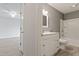 Bathroom with gray paint and white vanity with sink and shower and tub at 2612 Wade Hampton Rd, Hillsborough, NC 27278
