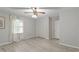 Bedroom featuring light gray walls, wood-look flooring, and double door closet at 2612 Wade Hampton Rd, Hillsborough, NC 27278