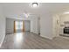 Bright living room with hardwood floors and open layout into the kitchen at 2612 Wade Hampton Rd, Hillsborough, NC 27278