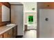 Bathroom vanity and shower, offering a clean and functional space with natural light at 2832 Ladale Ln, Mebane, NC 27302