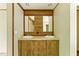 Bathroom with a double-sink vanity and mirrors, providing ample space and convenience at 2832 Ladale Ln, Mebane, NC 27302
