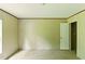 A clean empty room with bright walls, with a door, ready for personalization at 2832 Ladale Ln, Mebane, NC 27302