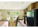 A fully-equipped kitchen, featuring an island and an open design at 2832 Ladale Ln, Mebane, NC 27302
