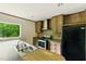 A kitchen with stainless steel appliances, with wooden cabinets at 2832 Ladale Ln, Mebane, NC 27302