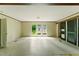 Open-concept living room features ample space and natural light streaming through large windows, great for entertaining at 2832 Ladale Ln, Mebane, NC 27302