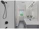 Modern bathroom featuring subway tile shower, quartz countertops, and contemporary fixtures at 3 Haggis Ct, Durham, NC 27705