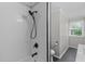 Modern bathroom with shower featuring subway tile, quartz countertops, and contemporary fixtures at 3 Haggis Ct, Durham, NC 27705