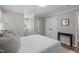 Comfortable bedroom with neutral colors, wood flooring, a closet and tasteful decor at 3 Haggis Ct, Durham, NC 27705
