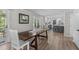 Dining area that provides access to an outdoor area and flows into an eat-in kitchen area at 3 Haggis Ct, Durham, NC 27705