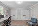 Bright home office with wood flooring and two closets, perfect for remote work at 3 Haggis Ct, Durham, NC 27705