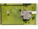 Aerial view of fenced backyard with shed at 30 Sunbury Ct, Zebulon, NC 27597
