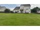 Expansive backyard with lush lawn provides ample space for recreation and relaxation at 30 Sunbury Ct, Zebulon, NC 27597