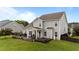 View of the backyard deck and spacious backyard at 30 Sunbury Ct, Zebulon, NC 27597