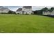 Expansive backyard with lush lawn provides ample space for recreation and relaxation at 30 Sunbury Ct, Zebulon, NC 27597