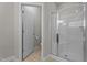 The bathroom includes a modern glass-enclosed shower and a separate toilet room for convenience at 30 Sunbury Ct, Zebulon, NC 27597