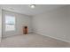Cozy carpeted bedroom with a window and neutral paint at 30 Sunbury Ct, Zebulon, NC 27597