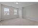 Large bedroom with two windows providing lots of natural light at 30 Sunbury Ct, Zebulon, NC 27597