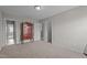 Carpeted bedroom with a dresser and multiple closets at 30 Sunbury Ct, Zebulon, NC 27597