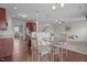 Bright breakfast nook featuring a table, chairs, and an open connection to the kitchen and living area at 30 Sunbury Ct, Zebulon, NC 27597