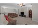 Spacious living room featuring plush seating and a media center for entertainment at 30 Sunbury Ct, Zebulon, NC 27597
