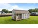 Functional storage shed located in the backyard offering extra storage space for tools and equipment at 30 Sunbury Ct, Zebulon, NC 27597