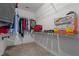 A spacious walk-in closet offers plenty of storage space for clothing and personal items at 30 Sunbury Ct, Zebulon, NC 27597