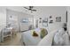 Bright bedroom with a desk, dresser, and comfortable bed, perfect for a cozy retreat at 300 Redhill Rd, Holly Springs, NC 27540