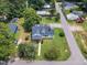 Aerial view of charming home, mature trees, and a well-maintained yard at 302 Hester St, Knightdale, NC 27545