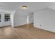 Attic bedroom with wood-look floors and a view of the neighborhood at 302 Hester St, Knightdale, NC 27545