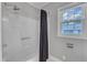 Bathroom features shower and window at 302 Hester St, Knightdale, NC 27545