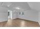 This bright bedroom provides natural light and an open floorplan at 302 Hester St, Knightdale, NC 27545