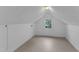 A white room with a window at 302 Hester St, Knightdale, NC 27545