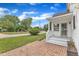 Inviting front yard with brick patio and landscaping at 302 Hester St, Knightdale, NC 27545