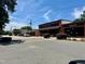 Street view of the buildings and shops in the commercial district at 302 Hester St, Knightdale, NC 27545