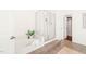 Modern bathroom with a glass-enclosed shower, soaking tub, and tile accents at 304 W Kirkfield Dr, Cary, NC 27518