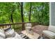 Cozy deck with outdoor seating and wooded views provides a serene relaxation spot at 304 W Kirkfield Dr, Cary, NC 27518