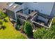An aerial view displays a pergola, hot tub and screened-in porch in the yard at 3128 Mountain Hill Dr, Wake Forest, NC 27587