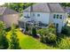 The home features a large lawn, screened-in porch, and manicured landscaping at 3128 Mountain Hill Dr, Wake Forest, NC 27587