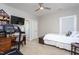 Bedroom with a workout area, study area, a bed and an open en suite bathroom at 3128 Mountain Hill Dr, Wake Forest, NC 27587