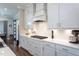Modern kitchen featuring white cabinets, subway tile backsplash, and stainless steel appliances at 3128 Mountain Hill Dr, Wake Forest, NC 27587