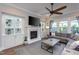 Cozy living room with fireplace, built-in shelving, and plenty of natural light at 3128 Mountain Hill Dr, Wake Forest, NC 27587
