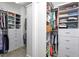 Spacious walk-in closet featuring built-in shelving, drawers, and ample storage for clothes and accessories at 3128 Mountain Hill Dr, Wake Forest, NC 27587