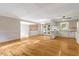 Bright living room featuring hardwood floors and white trim for an inviting atmosphere at 3329 Broughton Dr, Durham, NC 27704