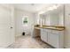 Spacious bathroom with a large mirror and a granite countertop vanity at 350 Pillow Ln, Burlington, NC 27217